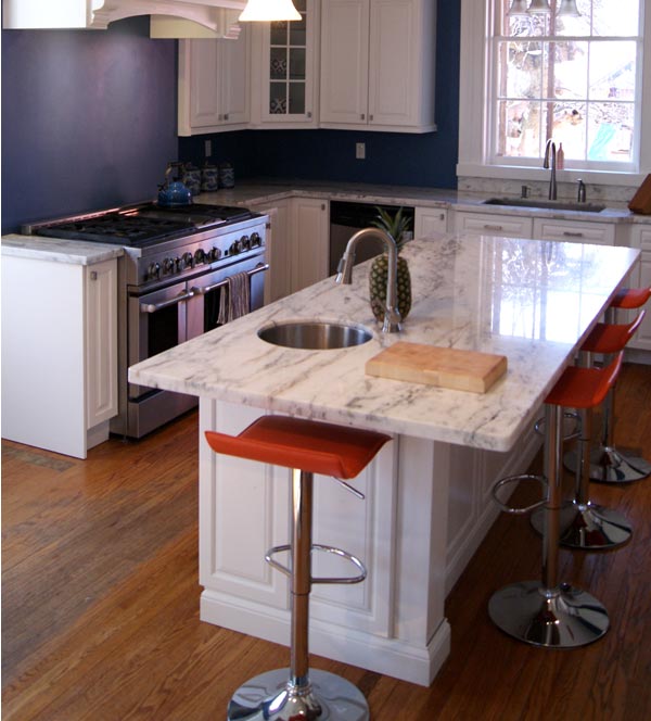 island, stove, and cabinets 